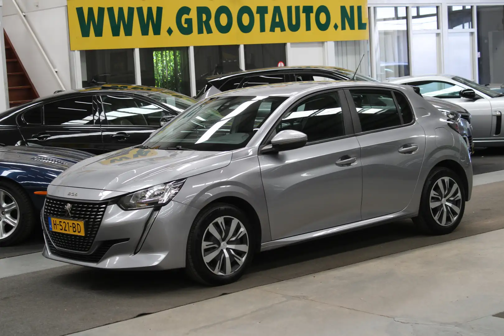 Peugeot 208 1.2 PureTech Blue Lease Active NAP, Airco, Navi, C Grijs - 1