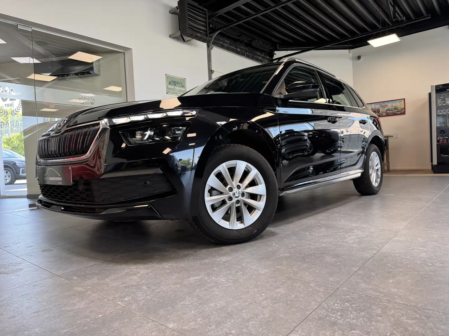 Skoda Kamiq 1.0 TSI Ambition  camera * zetelverwarming * LED * Zwart - 1
