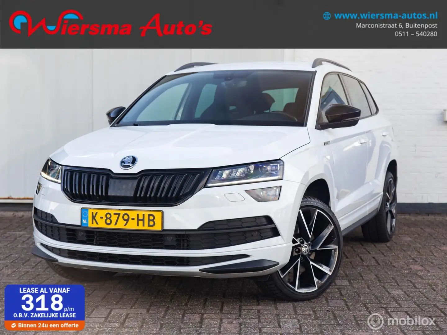 Skoda Karoq 1.5 TSI Sportline Orig.NL|Aut|Trekhaak|Carplay|ACC Wit - 1