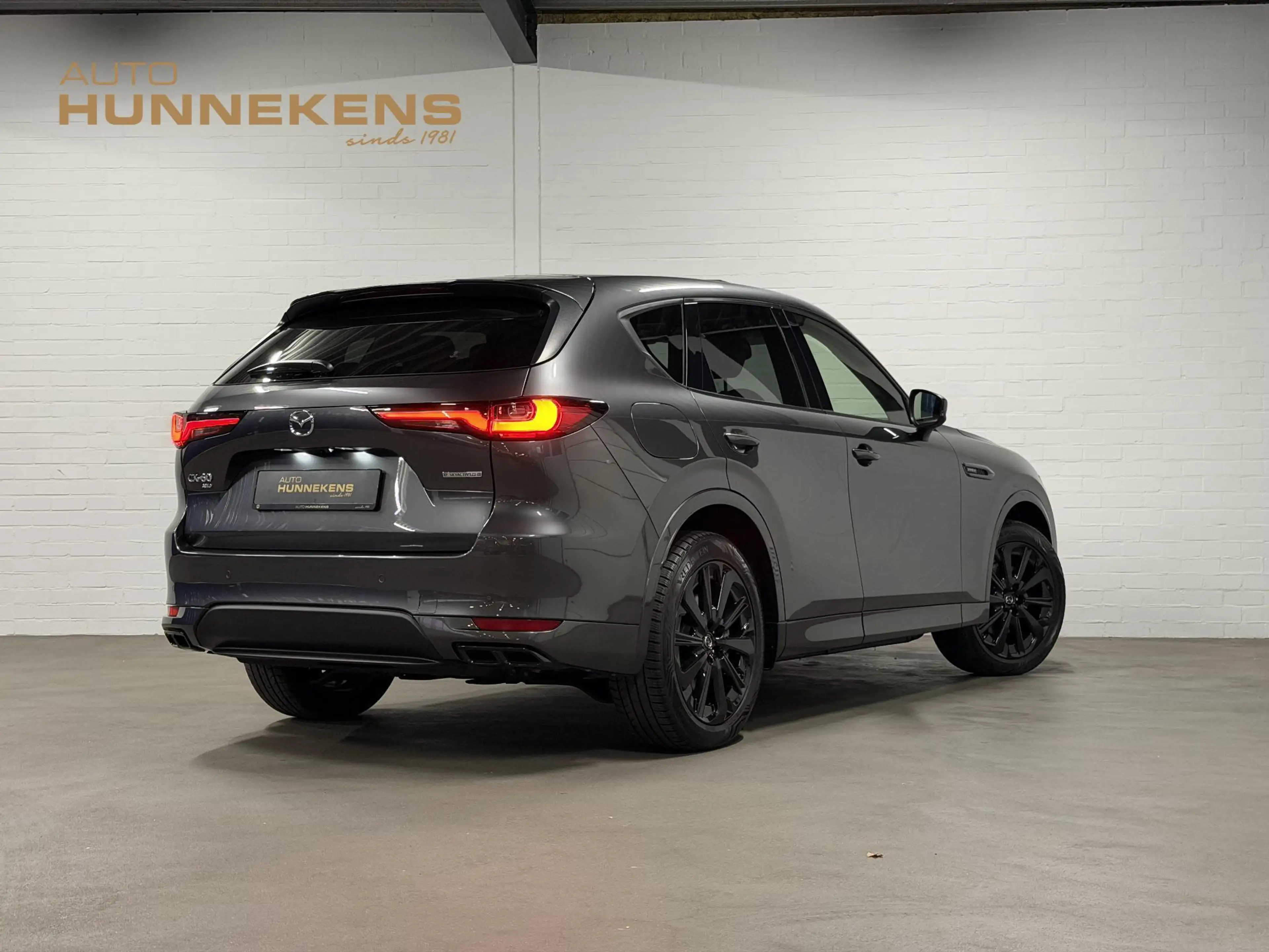 Mazda CX-60 2.5 e-SkyActiv PHEV Homura Trekhaak | Open dak | A — photo 2