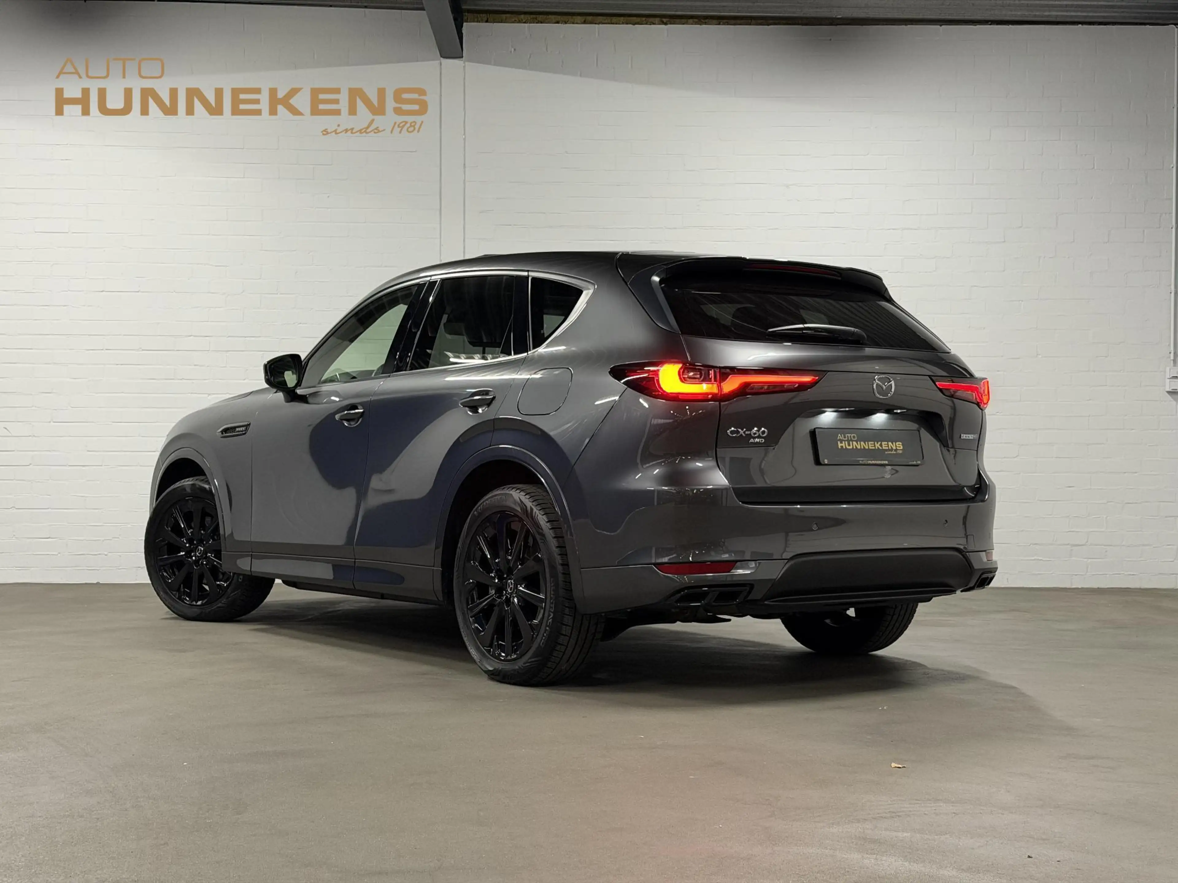 Mazda CX-60 2.5 e-SkyActiv PHEV Homura Trekhaak | Open dak | A — photo 6
