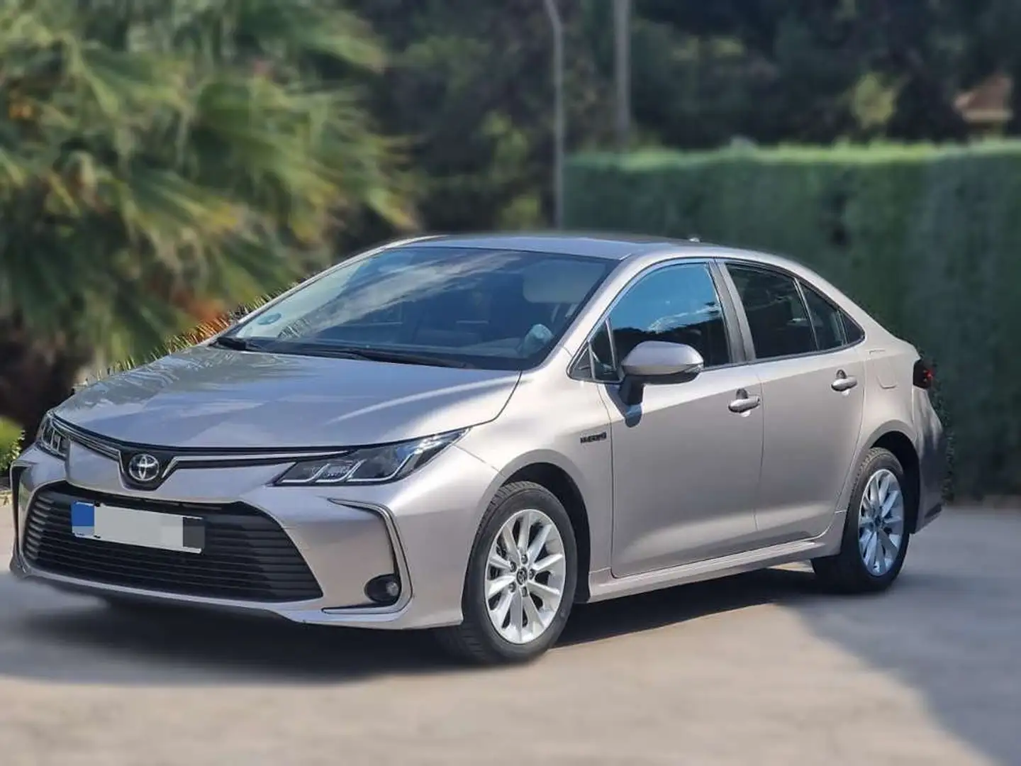 Toyota Corolla 1.8 125H ACTIVE TECH E-CVT SEDAN Gris - 1