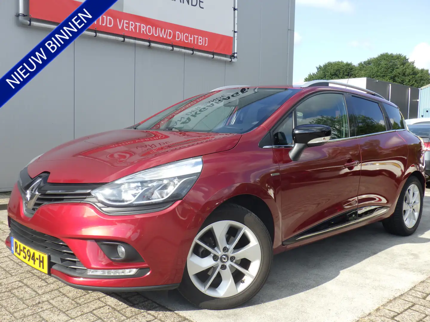 Renault Clio Estate 0.9 TCe Limited, Cruise, Navigatie, NL/NAP! Rood - 1