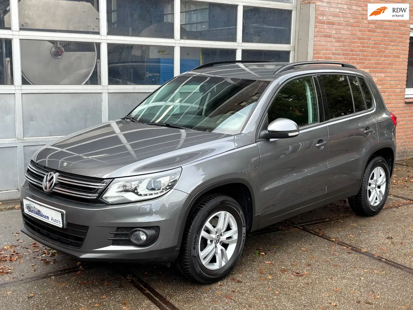 Volkswagen Tiguan 2.0 TSI Sport&Style 4Motion,AUTOMAAT,XENON,STOEL V Grijs - 1
