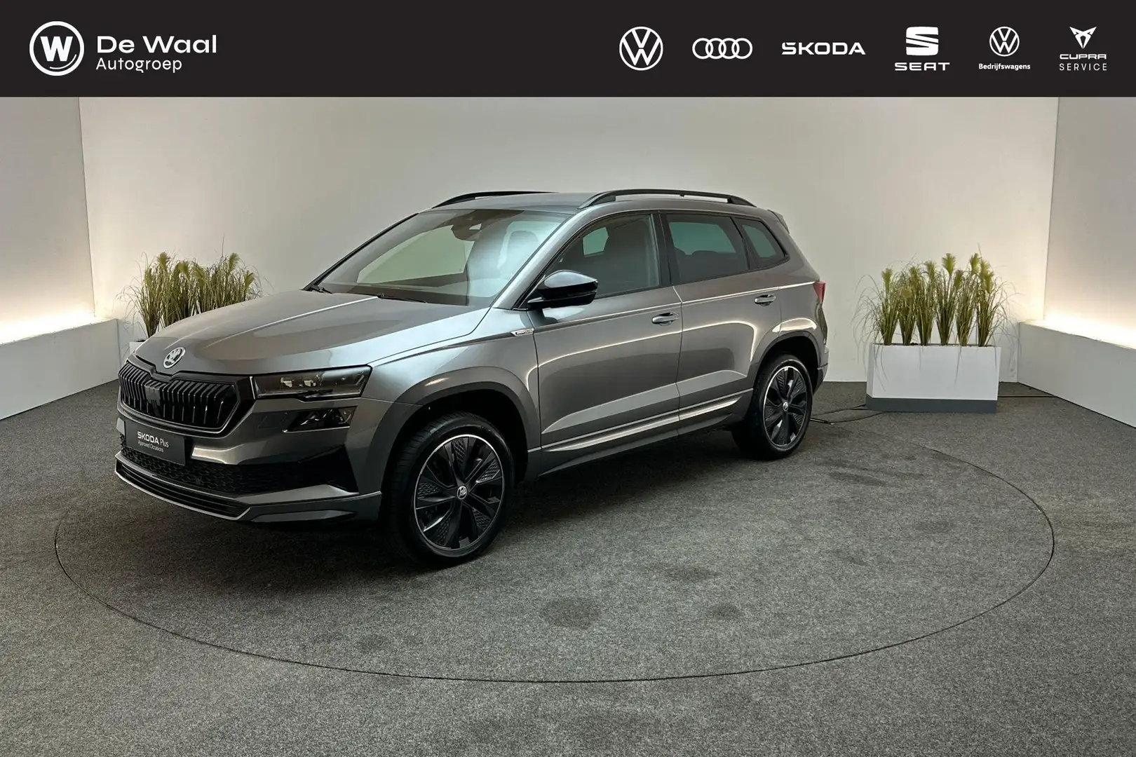 Skoda Karoq 1.5 TSI 150pk DSG ACT Sportline Business | Adaptiv Grijs - 1