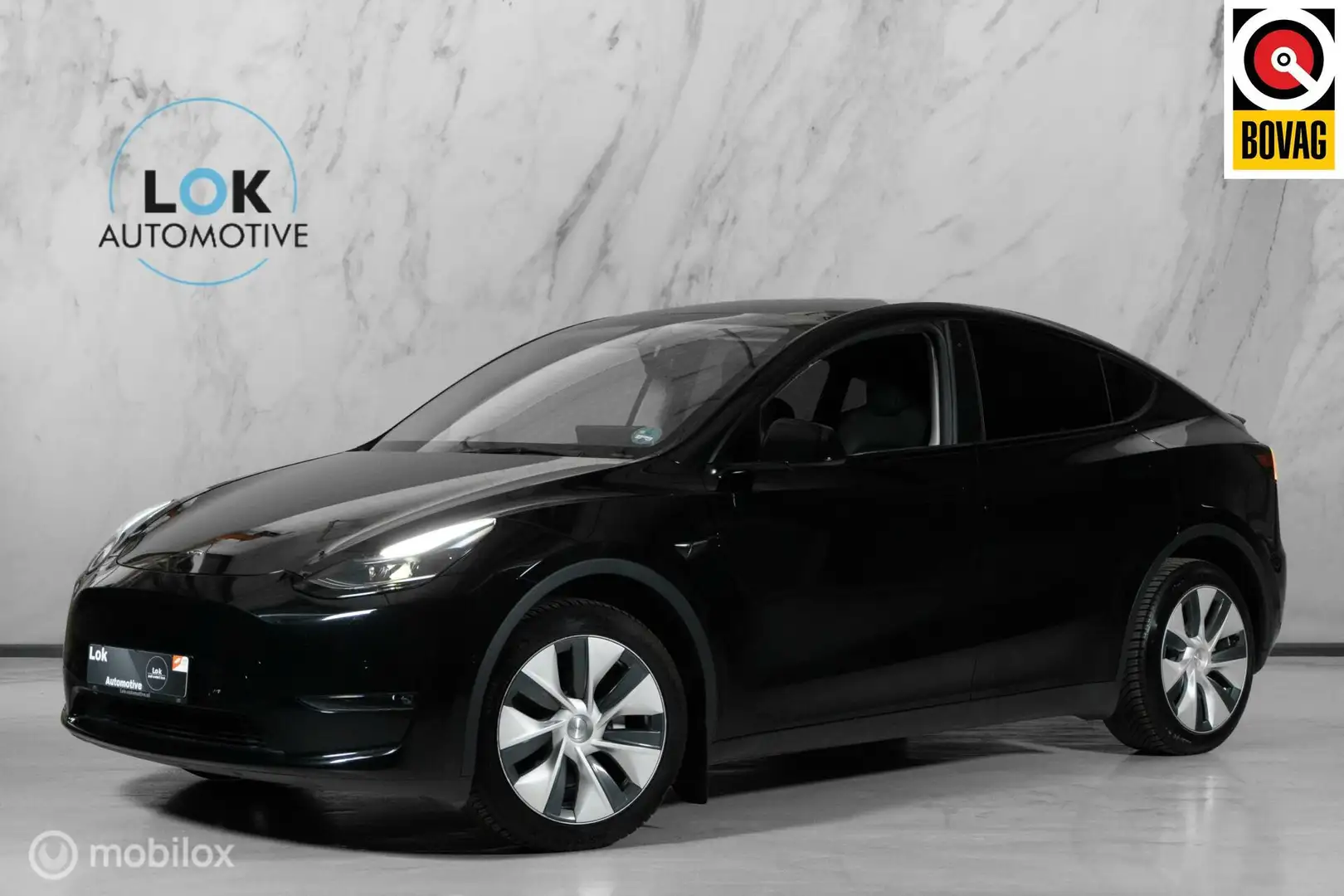 Tesla Model Y Long Range 75 kWh|AWD|AUTOPILOT|LEDER|515PK| Zwart - 1