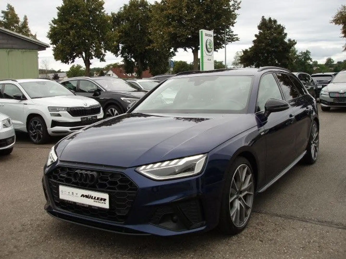 Audi A4 Avant 40 TDI quattro S line KAMERA/NAVI/SFW Blauw - 2
