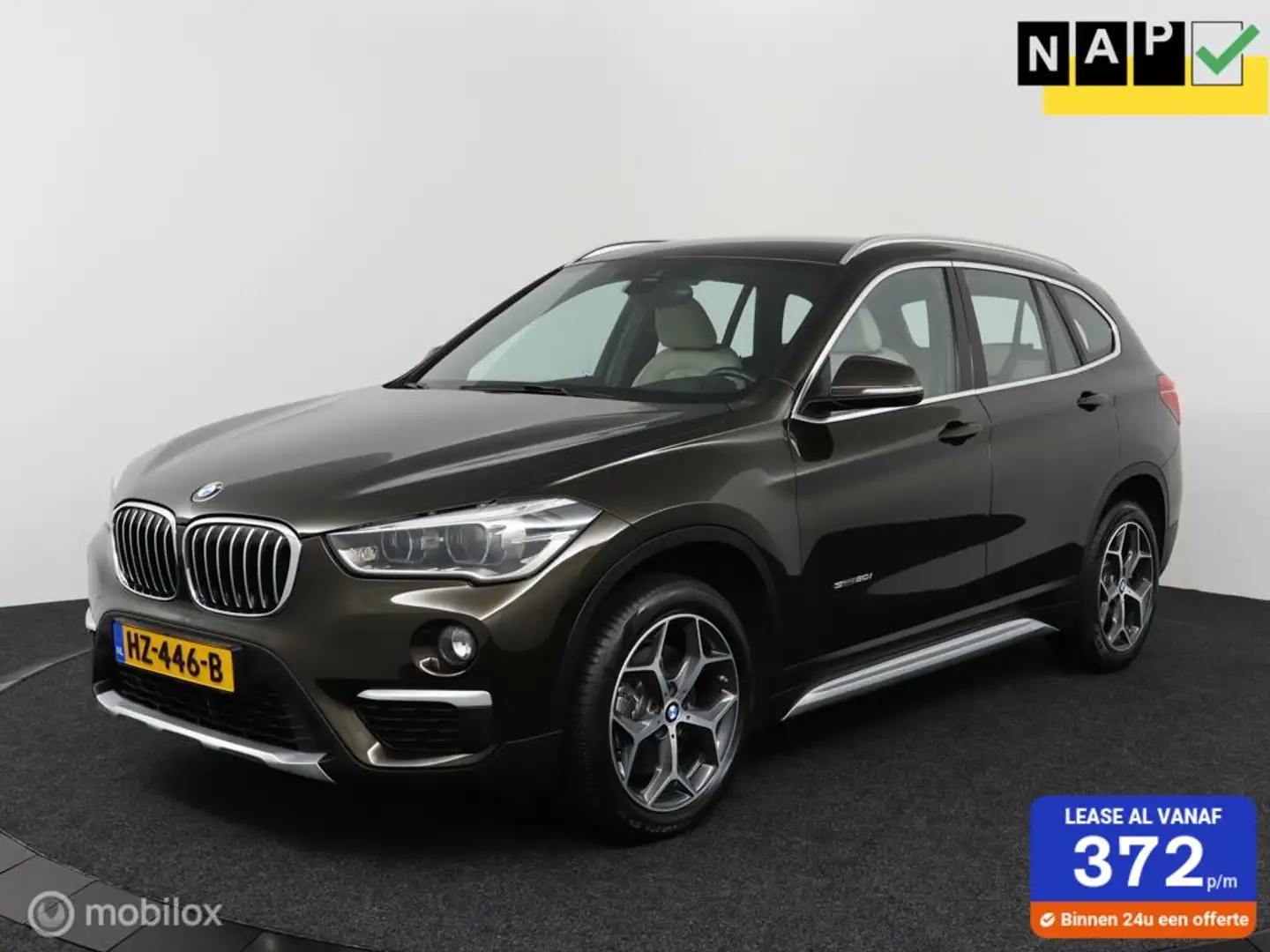 BMW X1 SDrive 2.0i 192Pk Aut-8 | Clima | Leder | Cruise | Bruin - 1