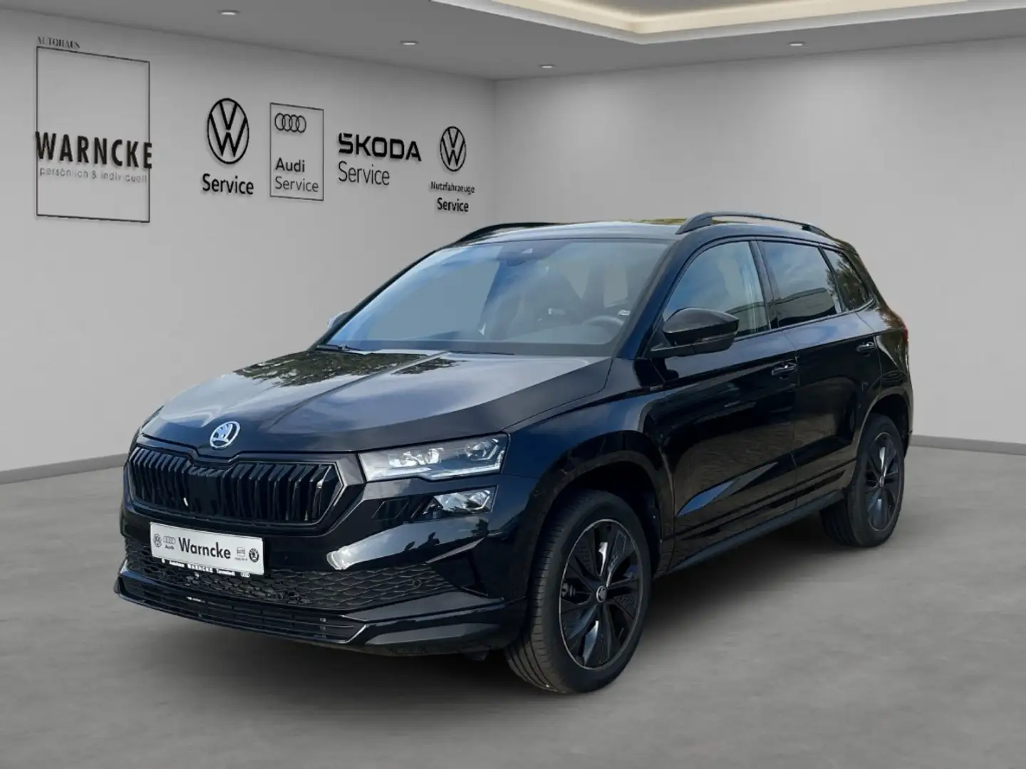 Skoda Karoq 1.5 TSI Sportline DSG MATRIX ACC AHK NAV PDC RFK S Schwarz - 1