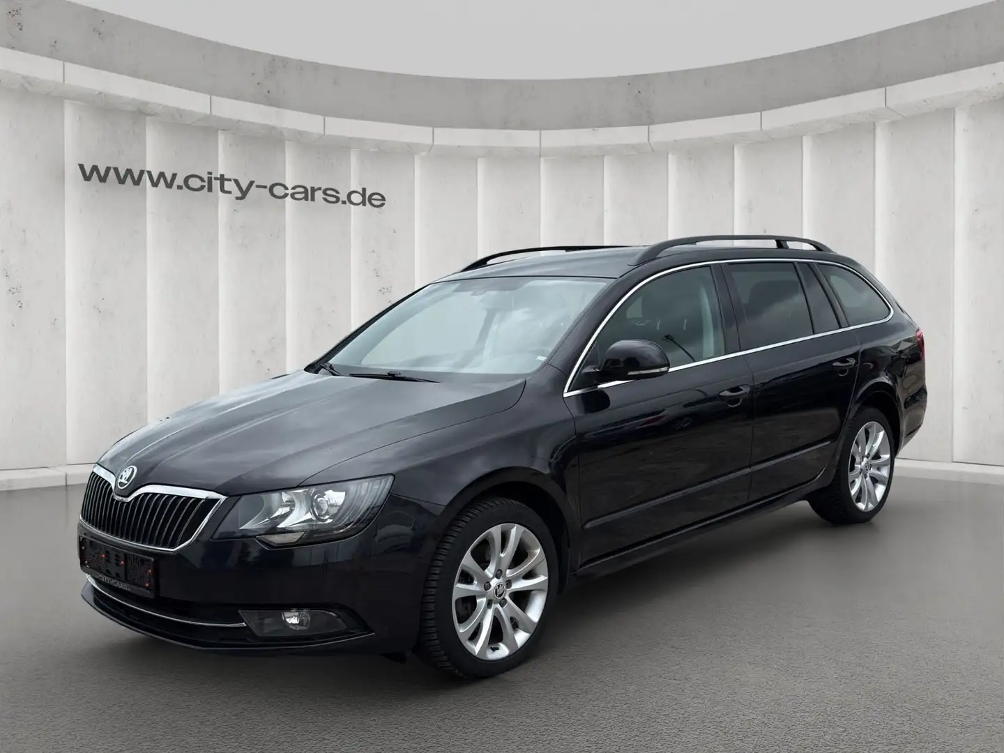 Skoda Superb Combi Exclusive*Autom.*Navi*Bi-Xenon*PDC Schwarz - 1