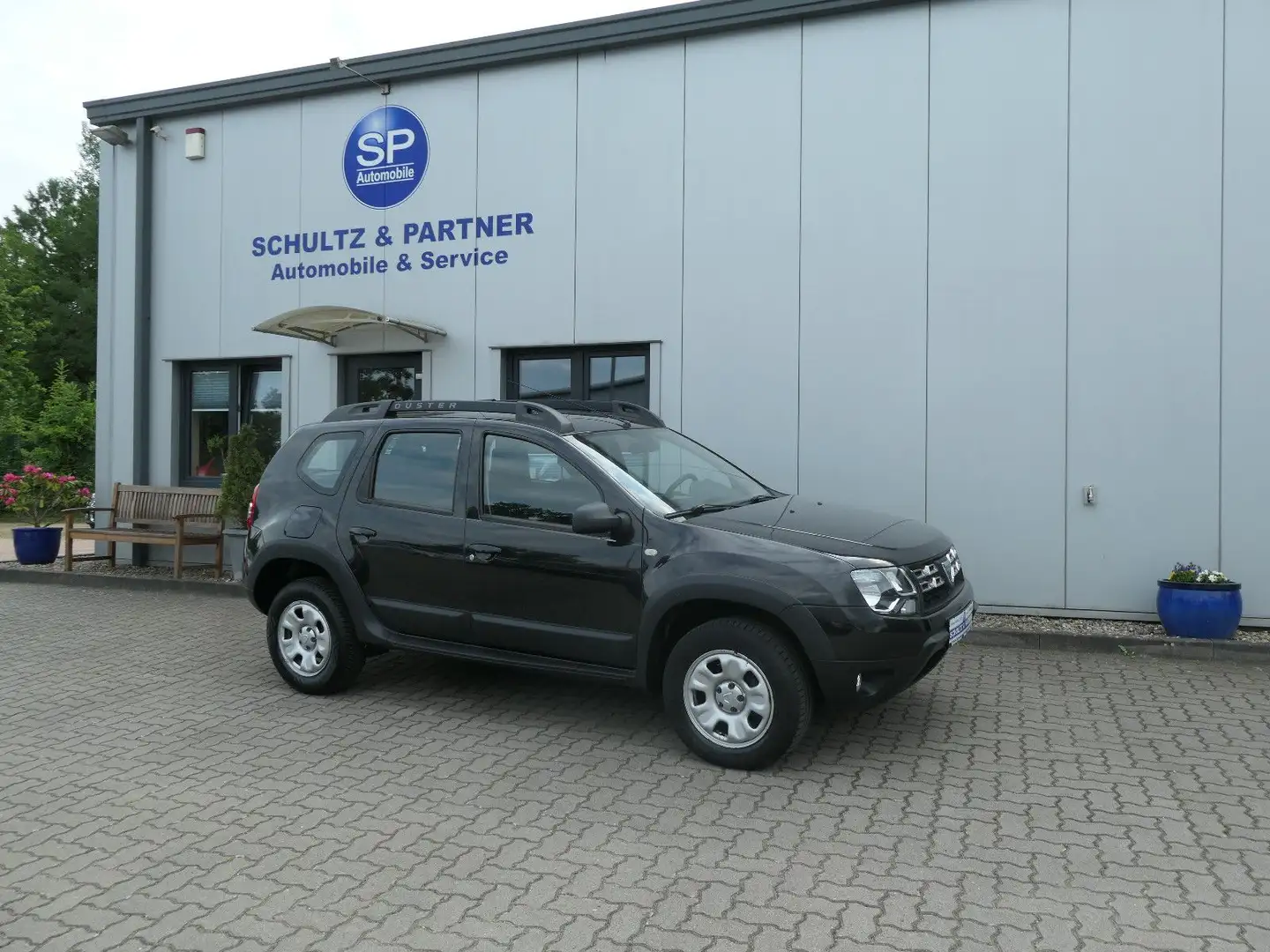 Dacia Duster I Laureate 4x2 // 1.Hd., Scheckh., PDC, Negro - 1