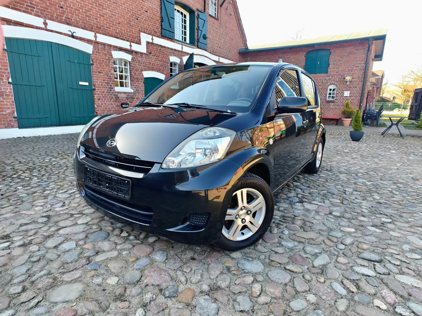 Daihatsu Sirion 1,3 Benziner /Sport Edition MOMO Design/Klima-Navi - 1