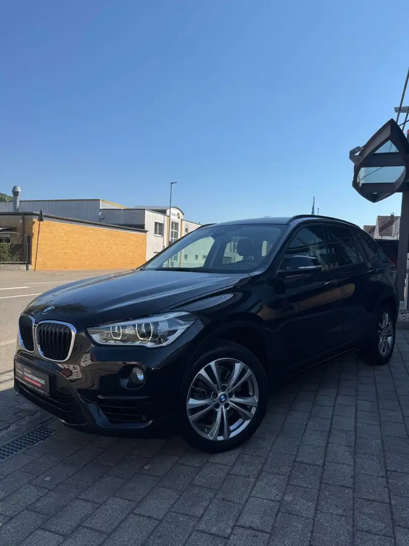 BMW X1 sDrive 20 i Sport Line+Allwetter+V.Historie Schwarz - 1