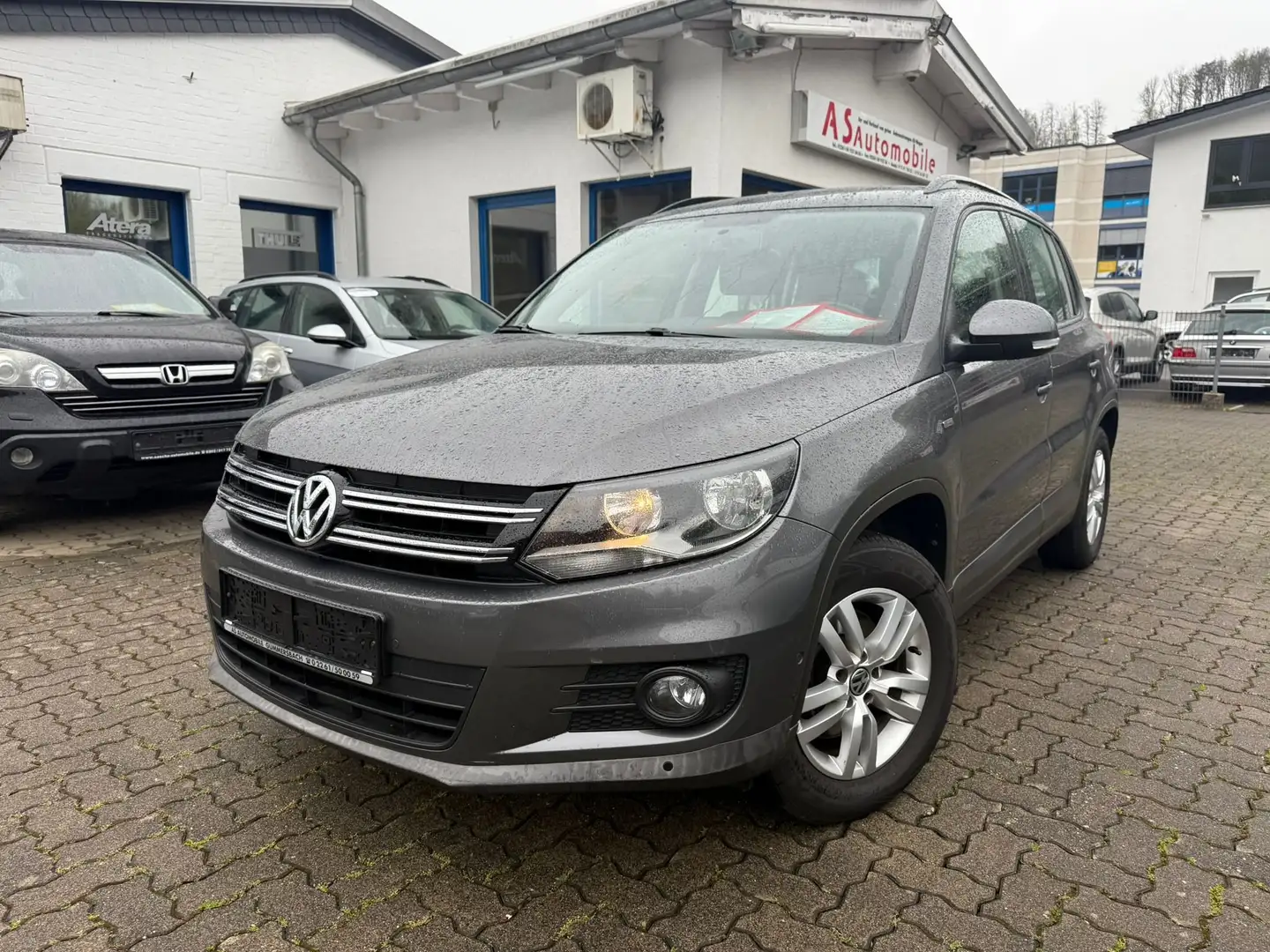 Volkswagen Tiguan 1.4 16V Life+2.HAND+KLIMATRONIK+6 GANG+PDC+EURO 5 Szary - 1