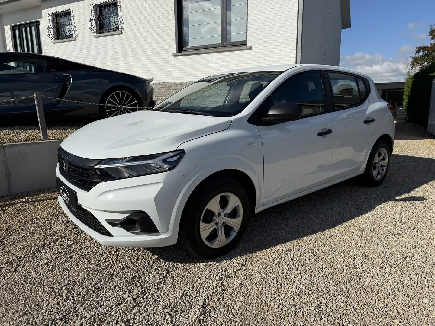 Dacia Sandero Sandero SCe 65 Comfort eerste eigenares historie Blanc - 1