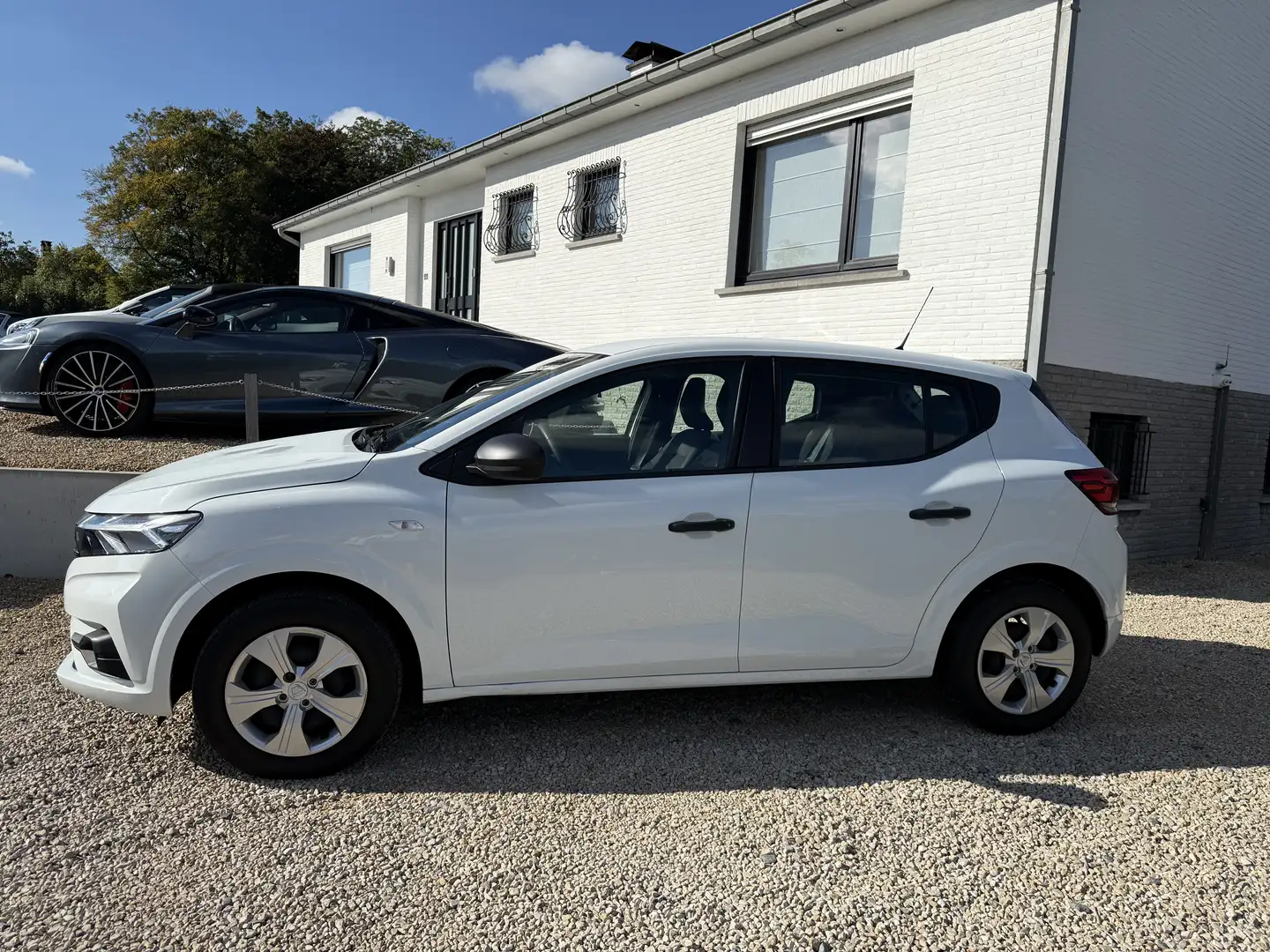 Dacia Sandero Sandero SCe 65 Comfort eerste eigenares historie Blanc - 2