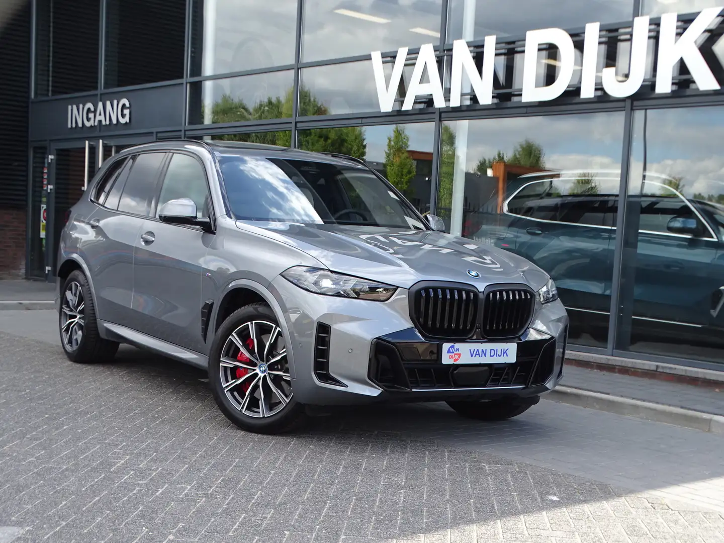 BMW X5 xDrive50e M Sportpakket Pro. Pano.Dak Elek.trekhaa Grijs - 1