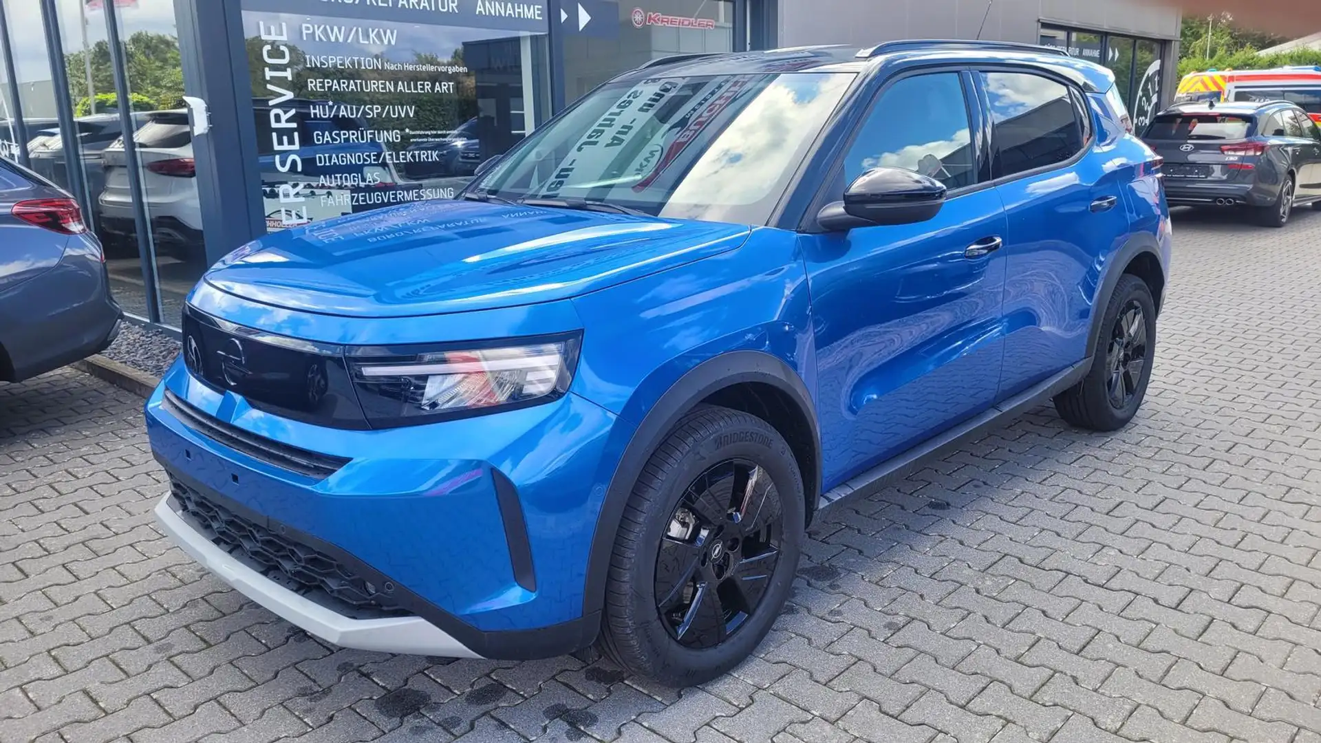 Opel Frontera Ultimate 1.2 107 kW Ultimate*7Sitze*LED*Navi*Sh... Blau - 1