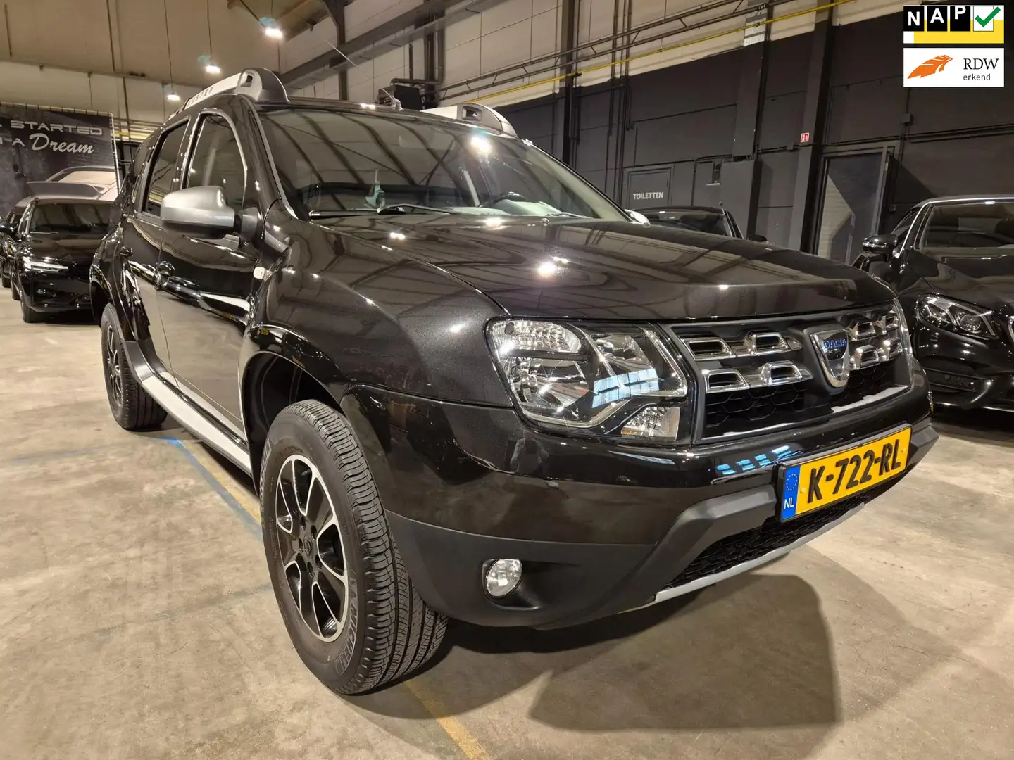 Dacia Duster 1.2 TCe 4x2 Série Limitée Robust - Navigatie - Cru Zwart - 1