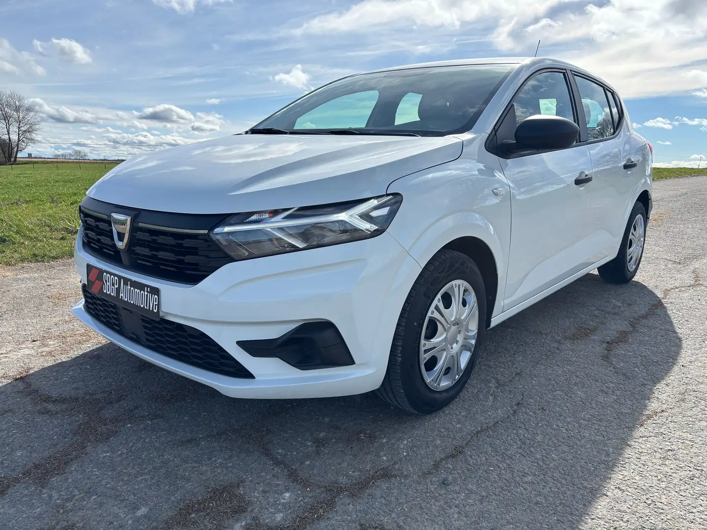 Dacia Sandero 1.0i SCe / New Model / 1er prop / Garantie 1an* Wit - 1