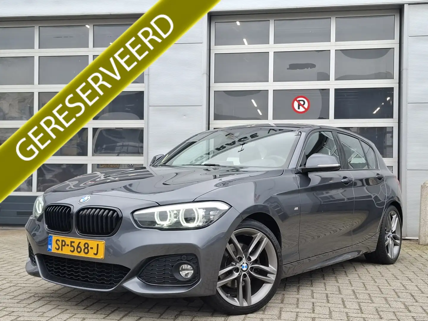 BMW 120 1-serie 120i High Executive | Navigatie/Carplay | Gris - 1