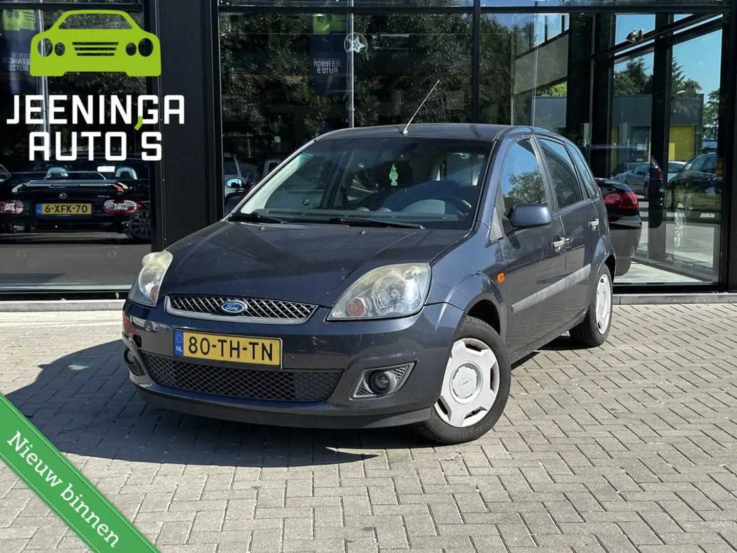 Ford Fiesta 1.4-16V Futura Grijs - 1