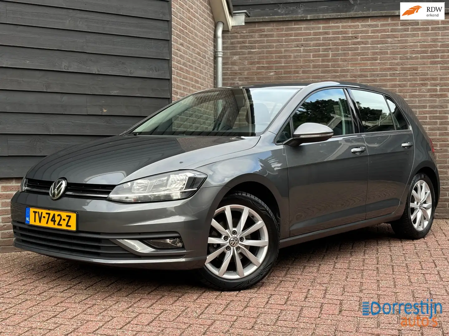 Volkswagen Golf 1.0 TSI Comfortline | Trekhaak | Cruise | Navi | F Gris - 1