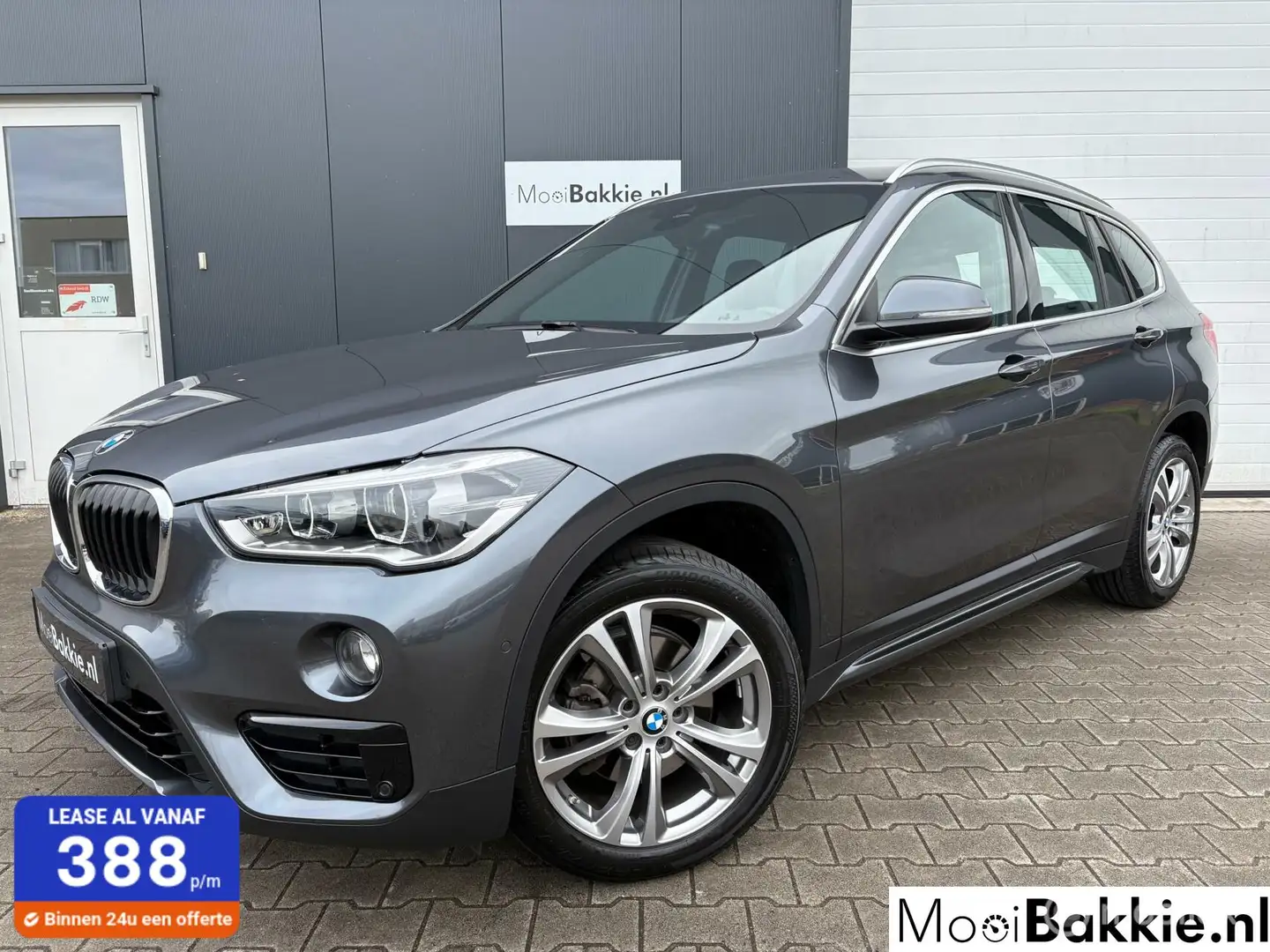 BMW X1 sDrive18i Automaat High Executive Origineel NL / N Gris - 1