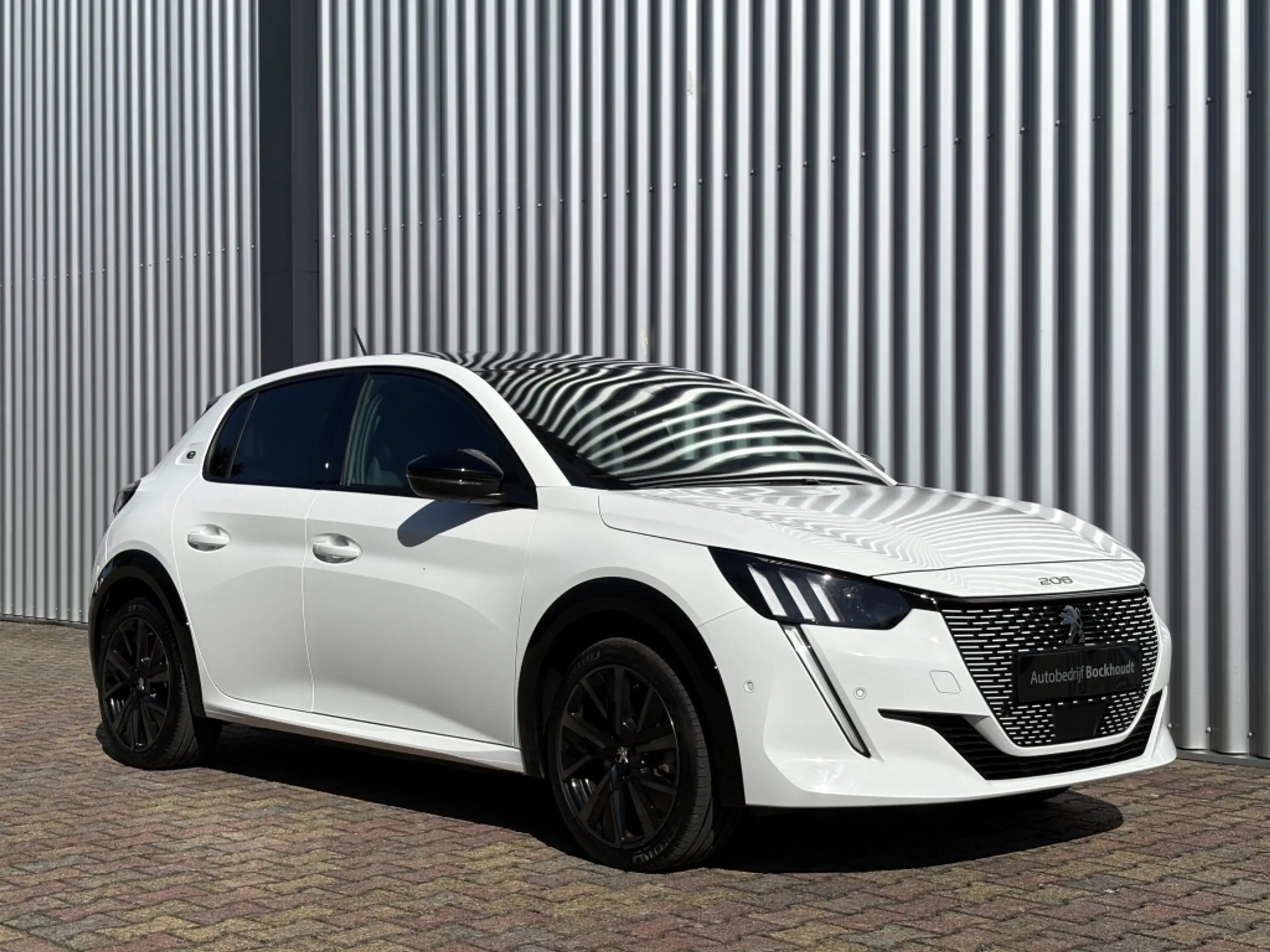 Peugeot e-208 GT 50 kWh | Panorama Dak | Stoelverw. | Navigatie — photo 10