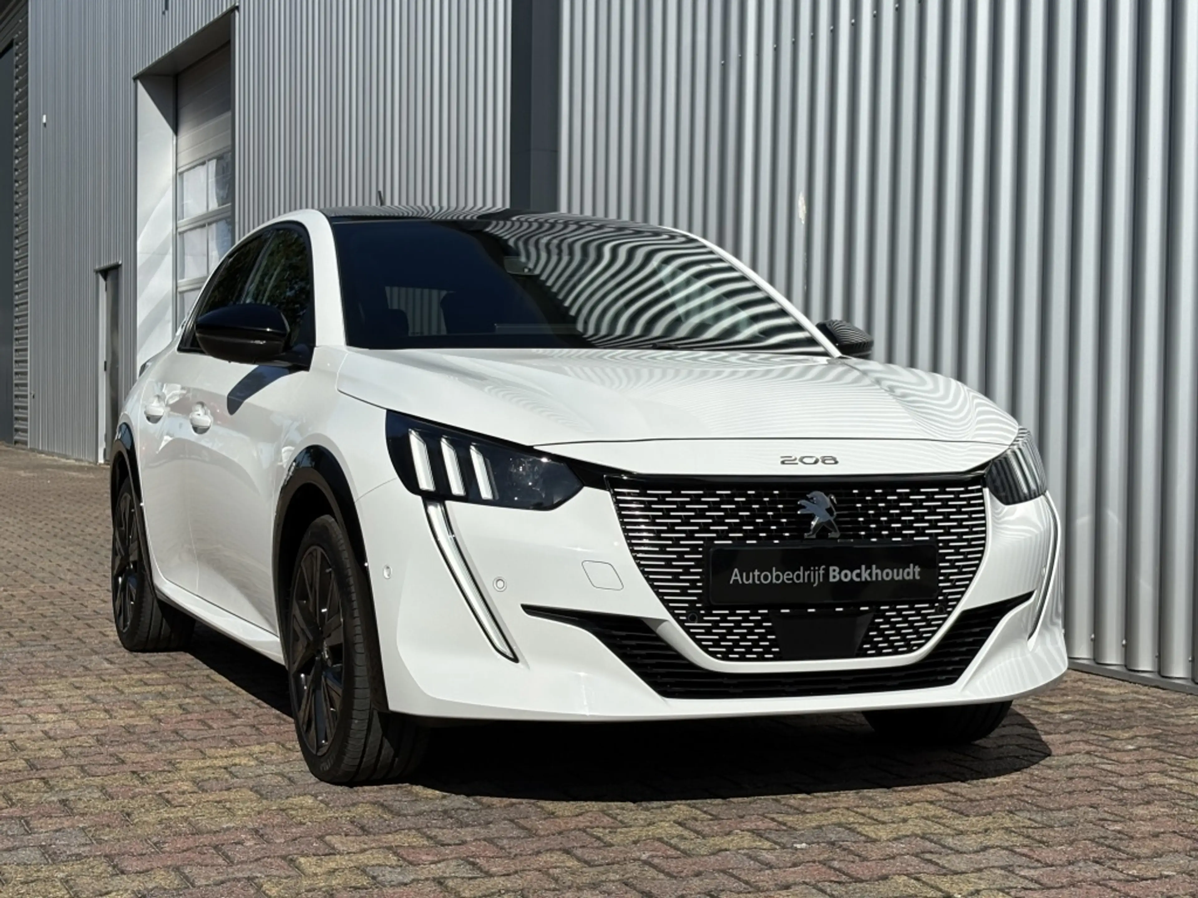 Peugeot e-208 GT 50 kWh | Panorama Dak | Stoelverw. | Navigatie — photo 11