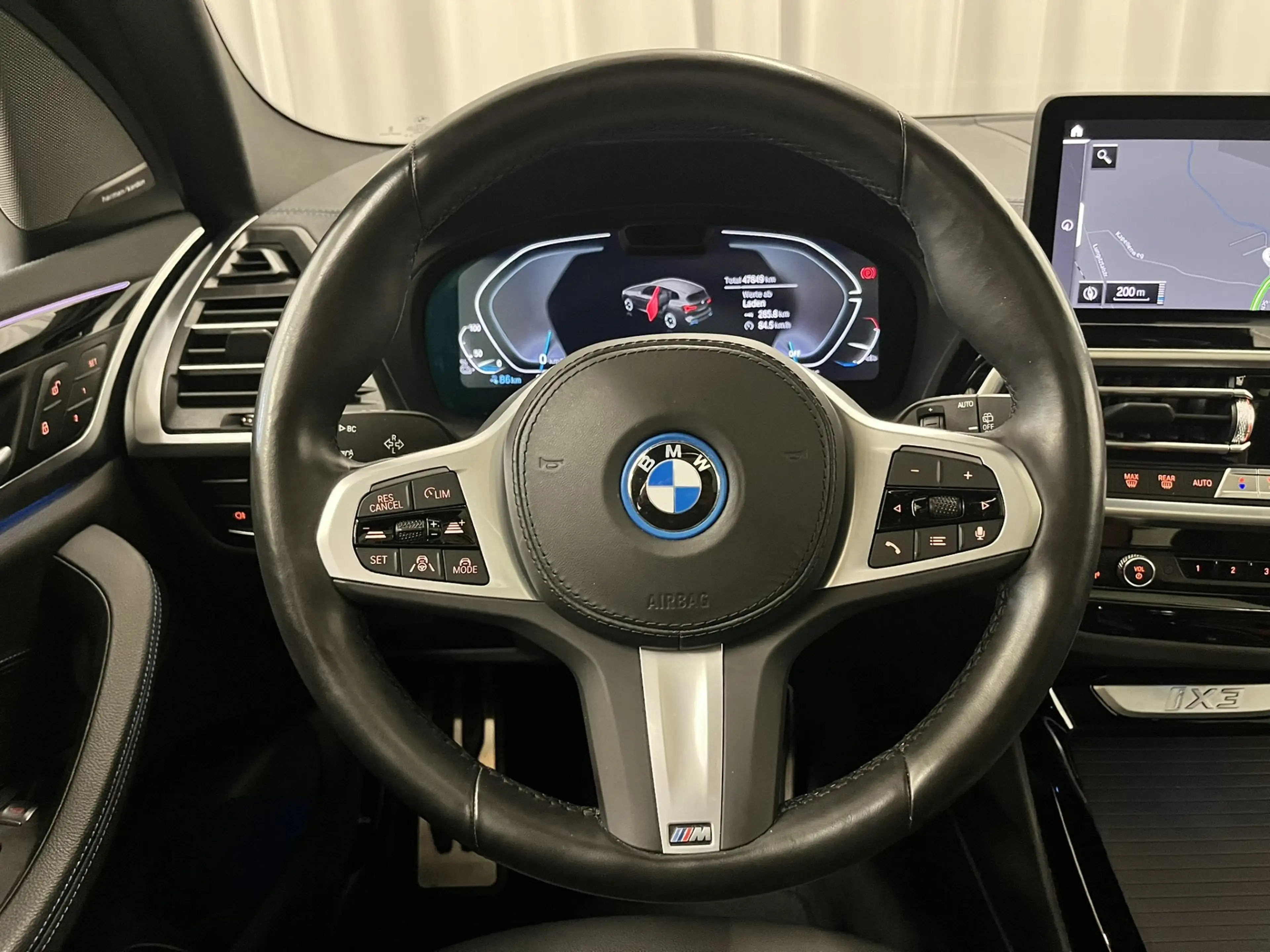 BMW iX3 *Impressive* — photo 10