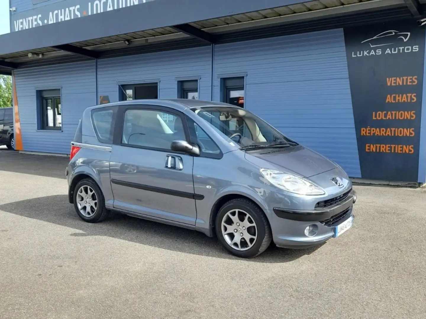 Peugeot 1007 1.4e 2-Tronic Dolce Grau - 1