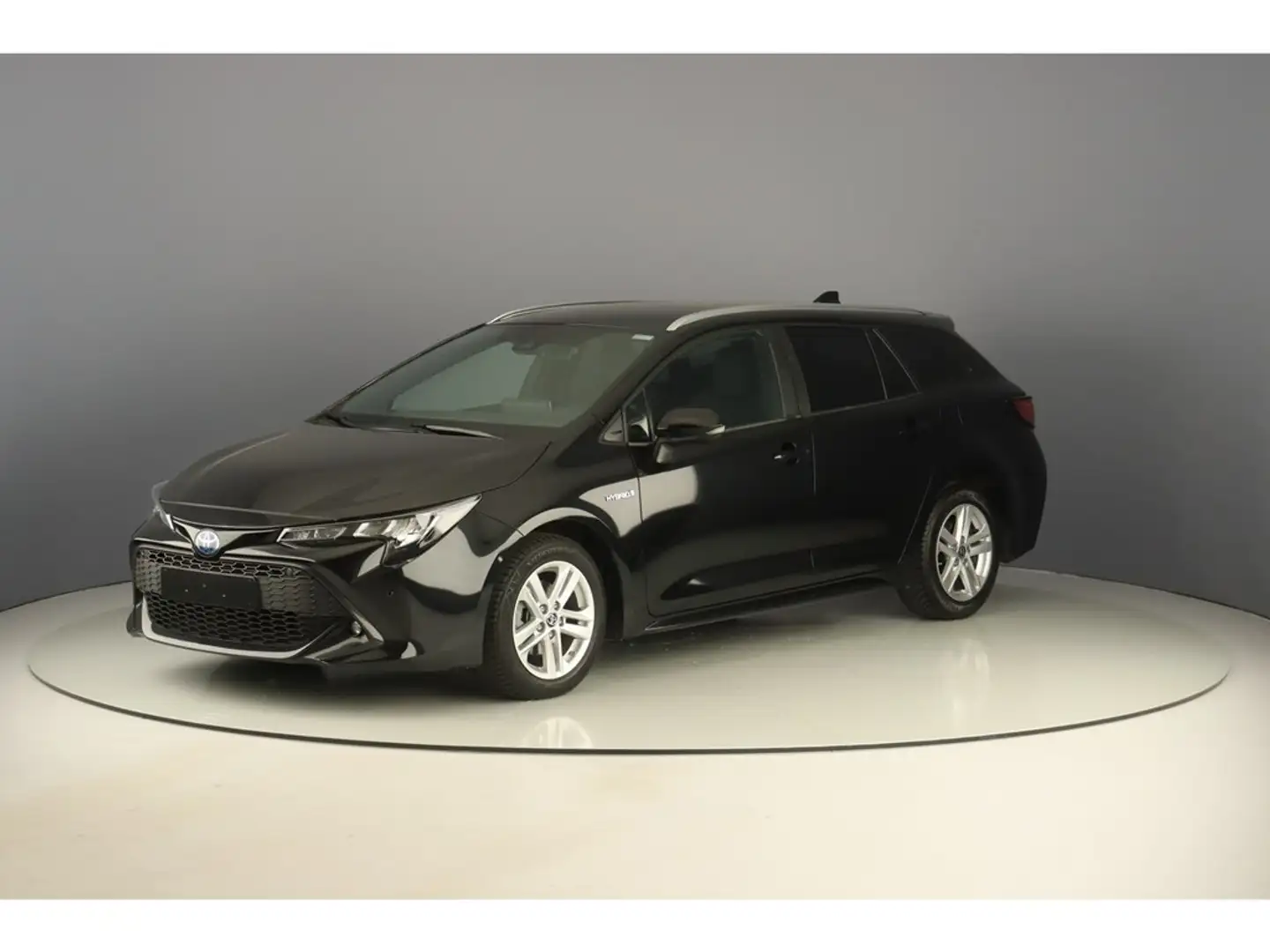 Toyota Corolla Touring Sports 1.8i Hybrid 122pk Dynamic Zwart - 1