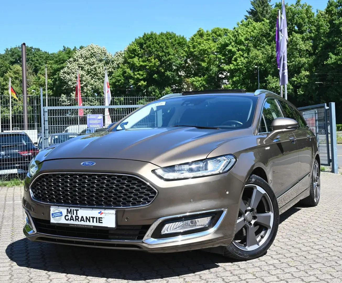Ford Mondeo Turnier 2.0 TDCi Vignale Leder Navi Pano Braun - 1