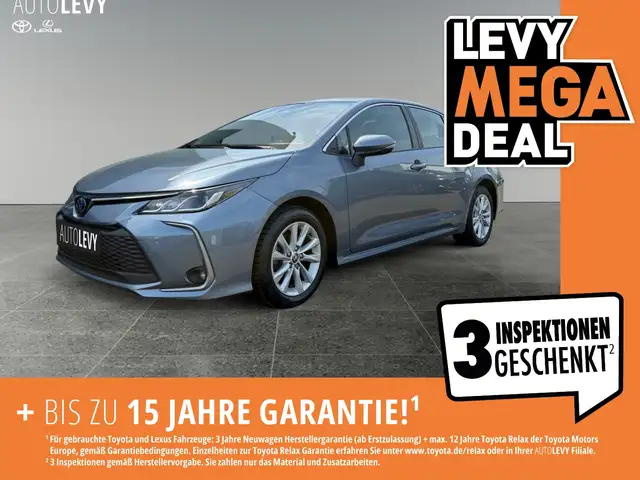 Toyota Corolla 1.8 Hybrid Sedan +Navi+CarPlay+Allwetter+