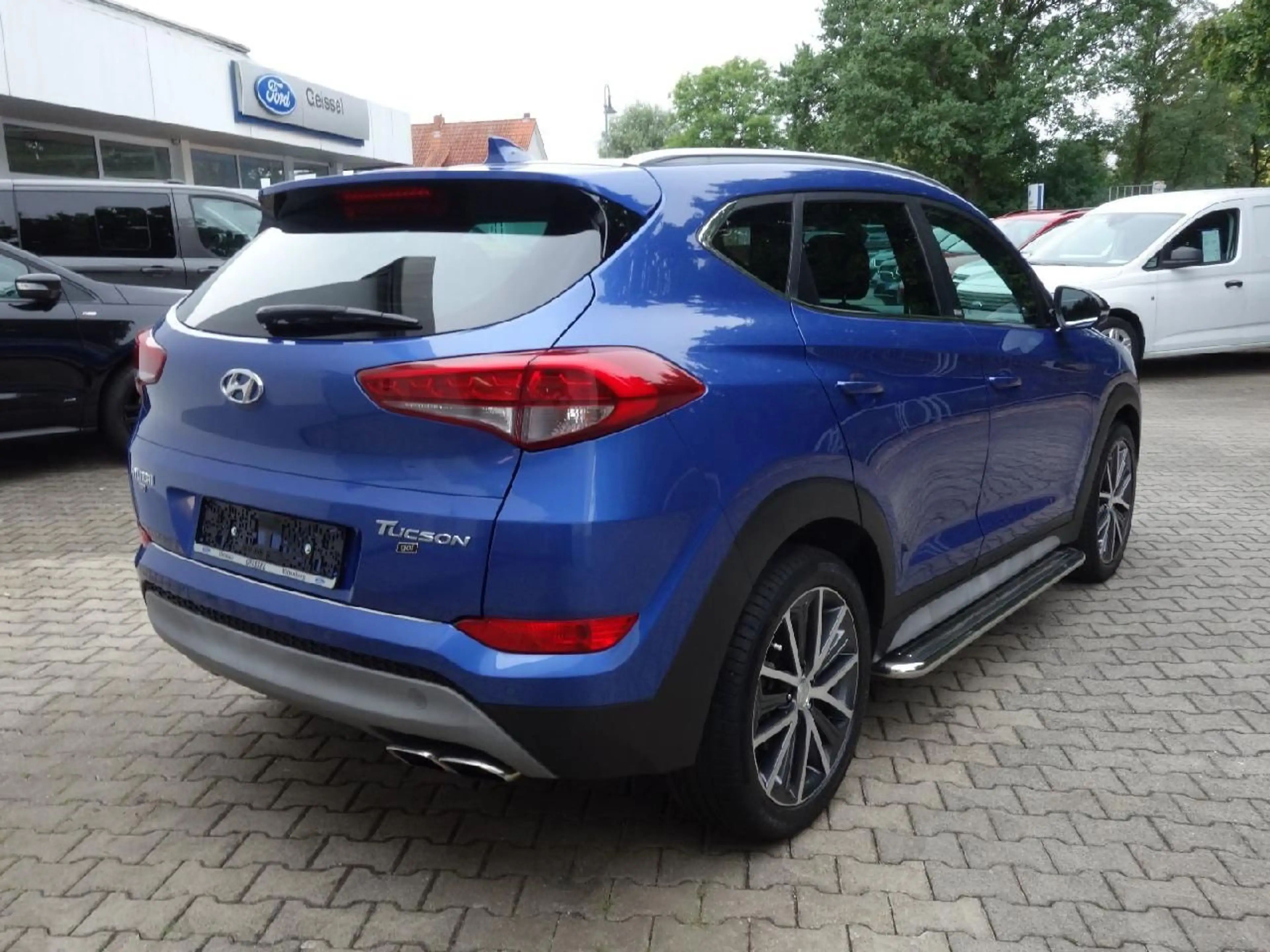 Hyundai TUCSON Passion + 2WD Autom NAVI DAB Winterp — photo 6