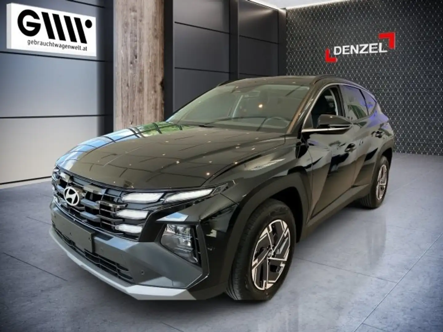 Hyundai TUCSON NX4 Jubile 1,6 T-GDi HEV 4WD AT Schwarz - 1
