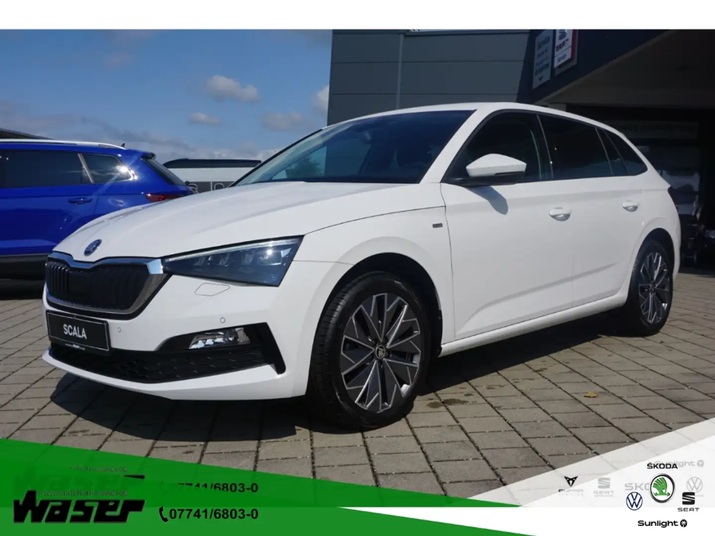 Skoda Scala 1.0 TSI Tour DSG Navi LED SHZ PDC Kamera Weiß - 1