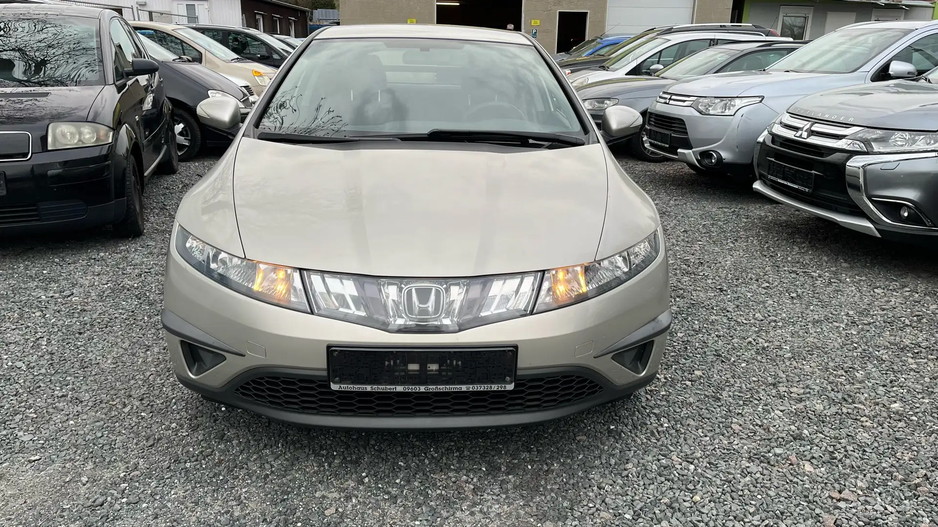 Honda Civic 1.4i-DSi Bronzo - 1