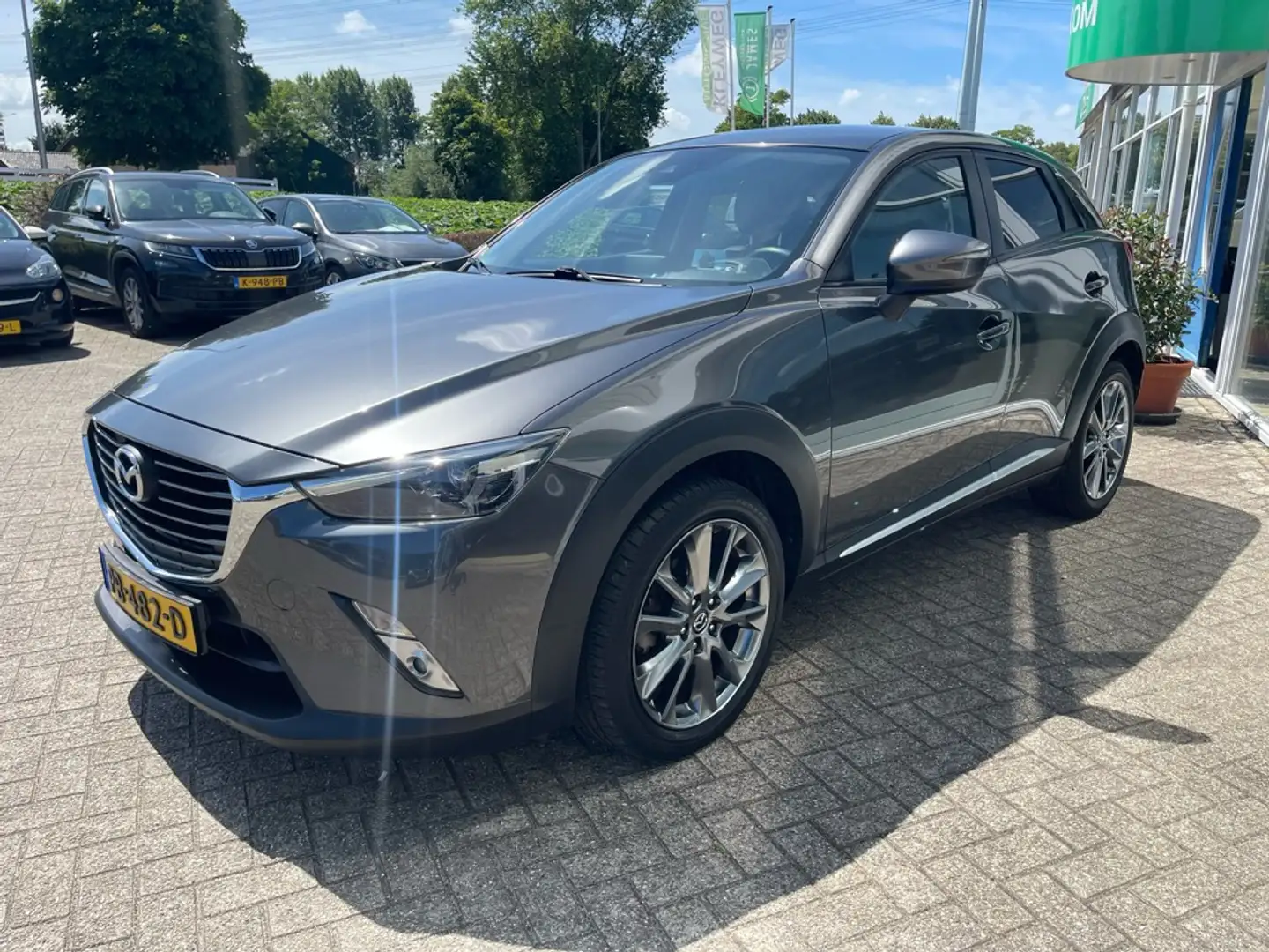 Mazda CX-3 2.0 SAG 120 GT-L, Aut, Nav, Camera, Grijs - 2