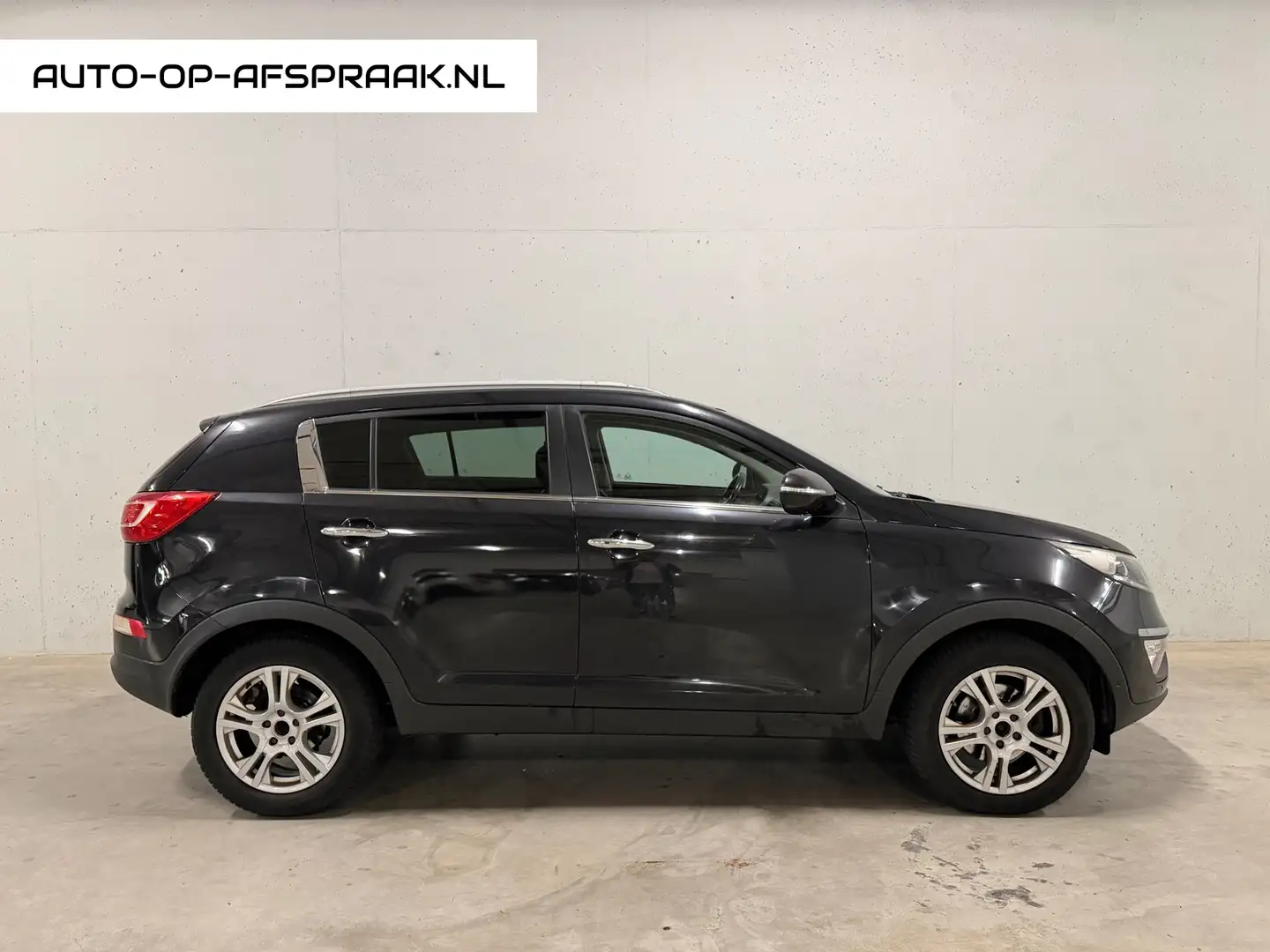 Kia Sportage 1.7 CRDI Super Pack Navi Clima Camera Cruise Trekh Schwarz - 1