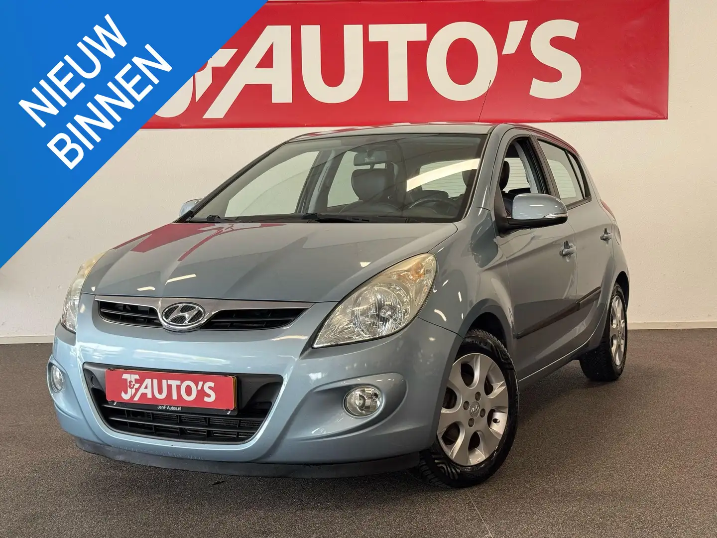 Hyundai i20 1.2i i-Catcher ECC AIRCO, LEER, ELEC PAKKET, Blauw - 1