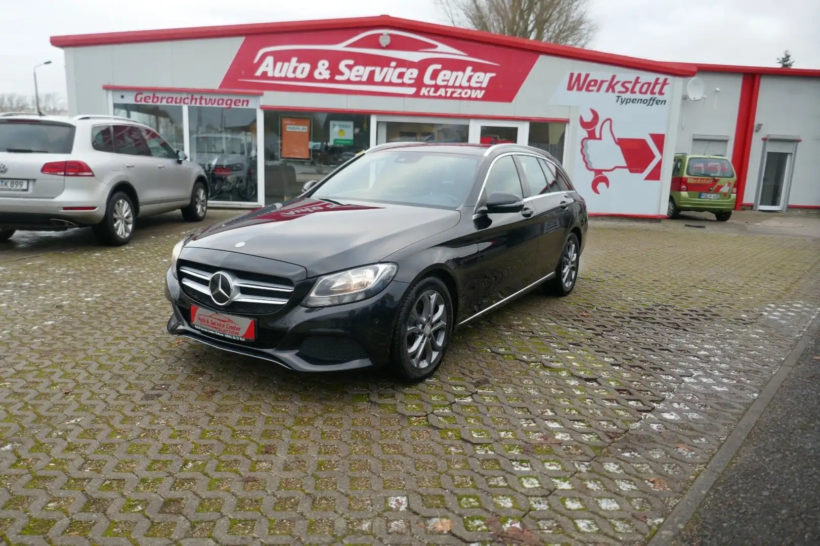 Mercedes-Benz C 180 T-Modell CGI  AUTOMATIK SHZ PDC NAVI Zwart - 1