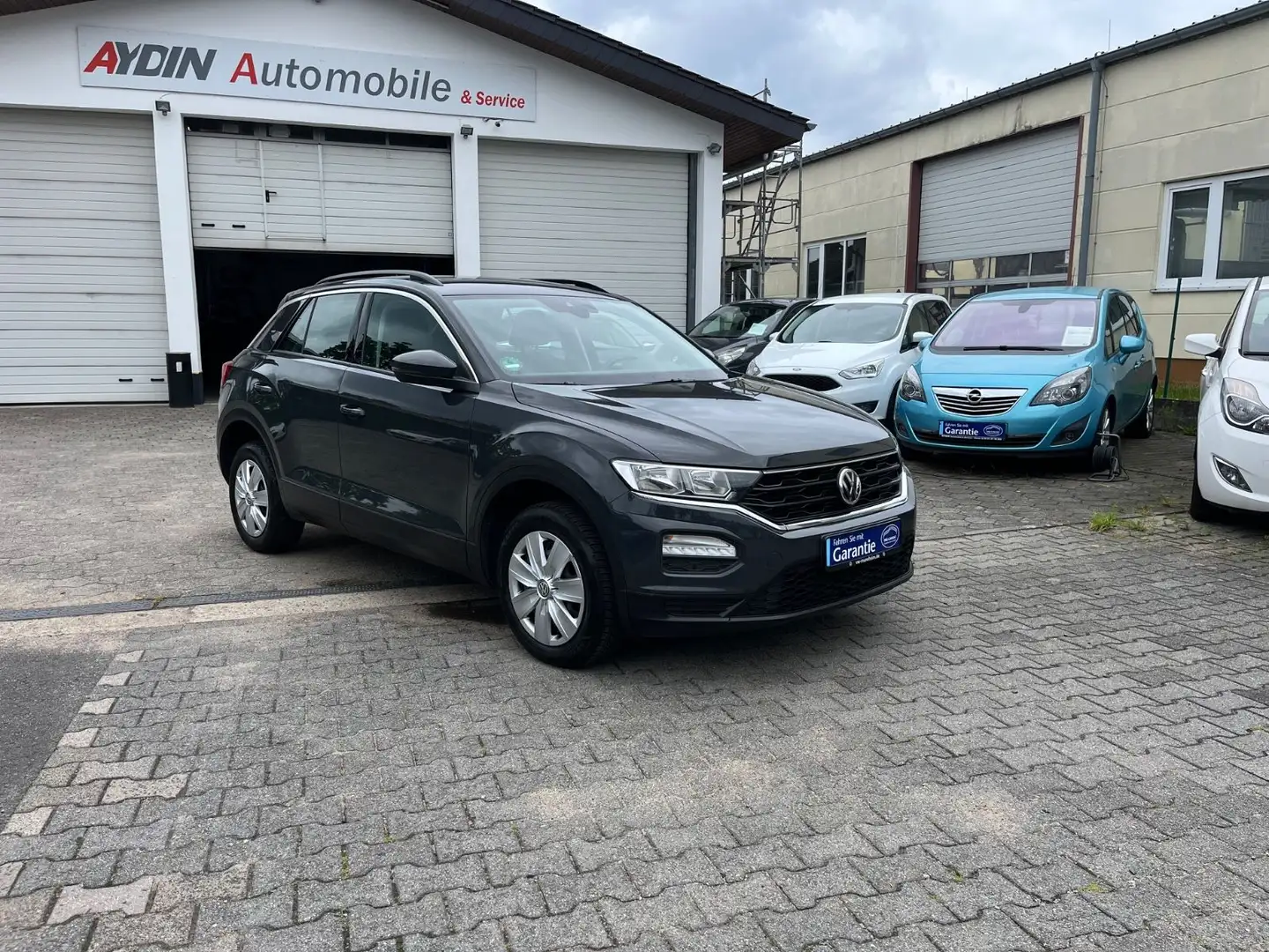 Volkswagen T-Roc .1.HAND-NAVI-SPURHALTEASS-PDC-GARANTIE Gris - 1