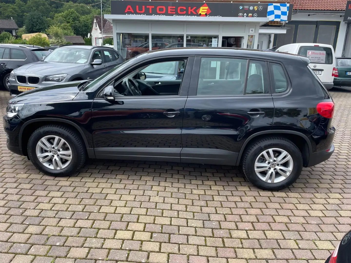 Volkswagen Tiguan 1,4 TSI PDC,RCD, BC ,SHZ Schwarz - 1