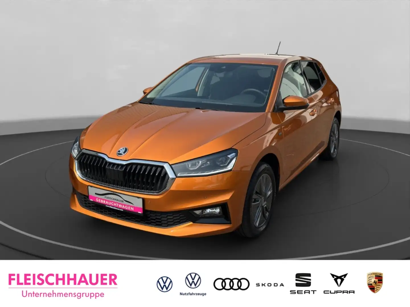 Skoda Fabia Tour TSI AHK LED+CarPlay+DSG+PDC Oranje - 1