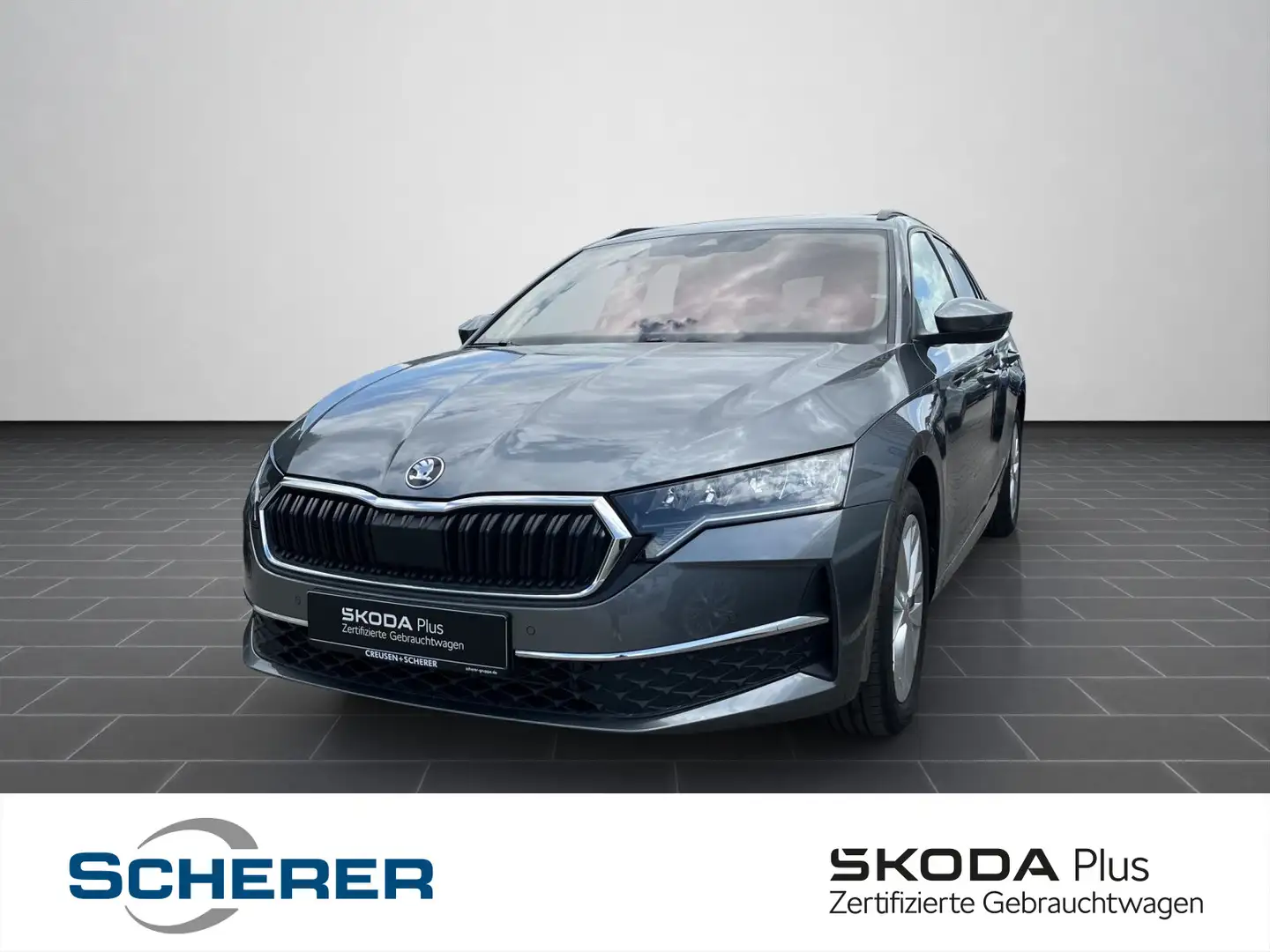 Skoda Octavia Combi 1.5 TSI DSG Selection AHK ACC NAVI Grijs - 1