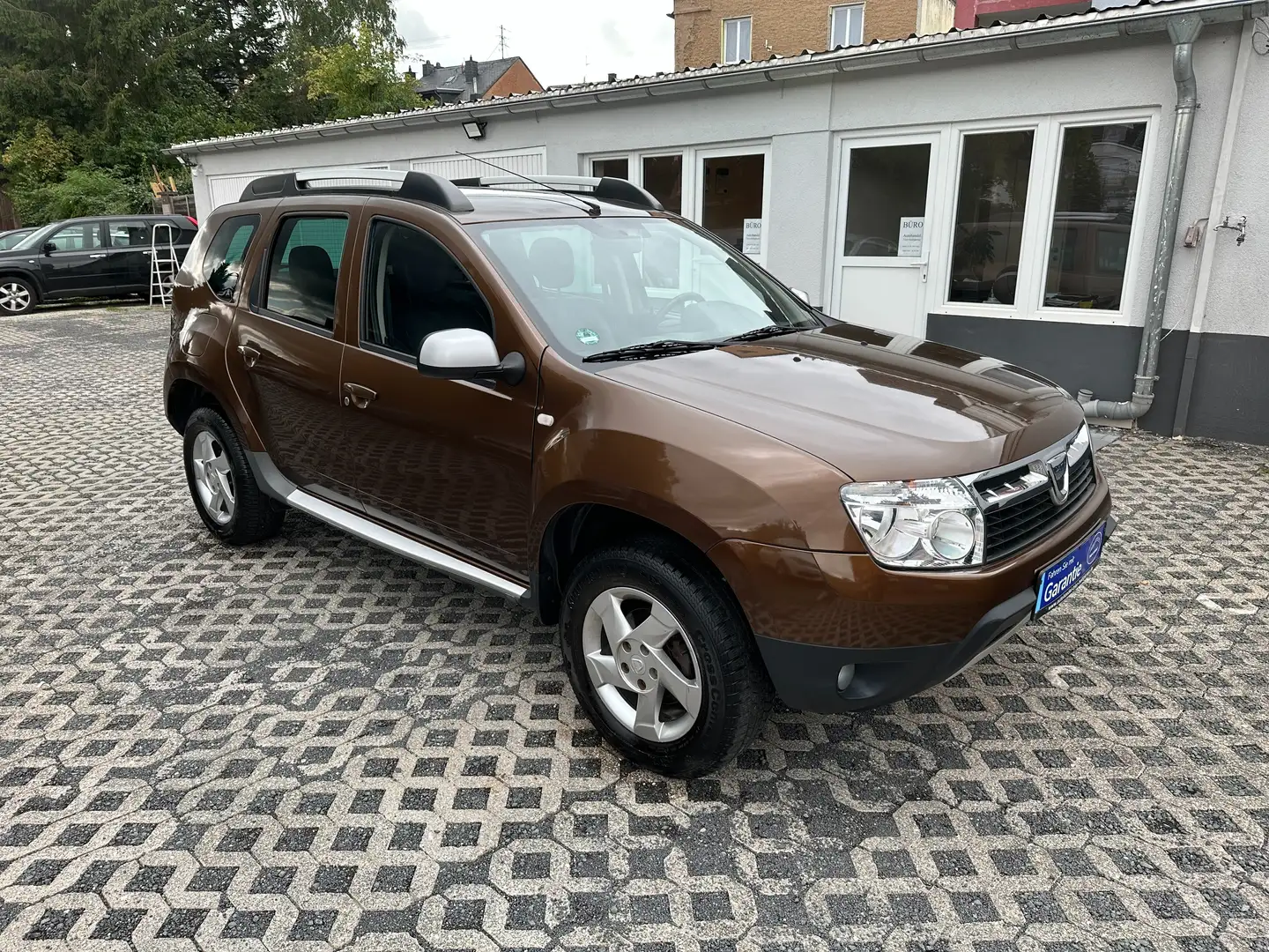 Dacia Duster Prestige 4x2 - Garantie, TÜV 12/26 Braun - 1