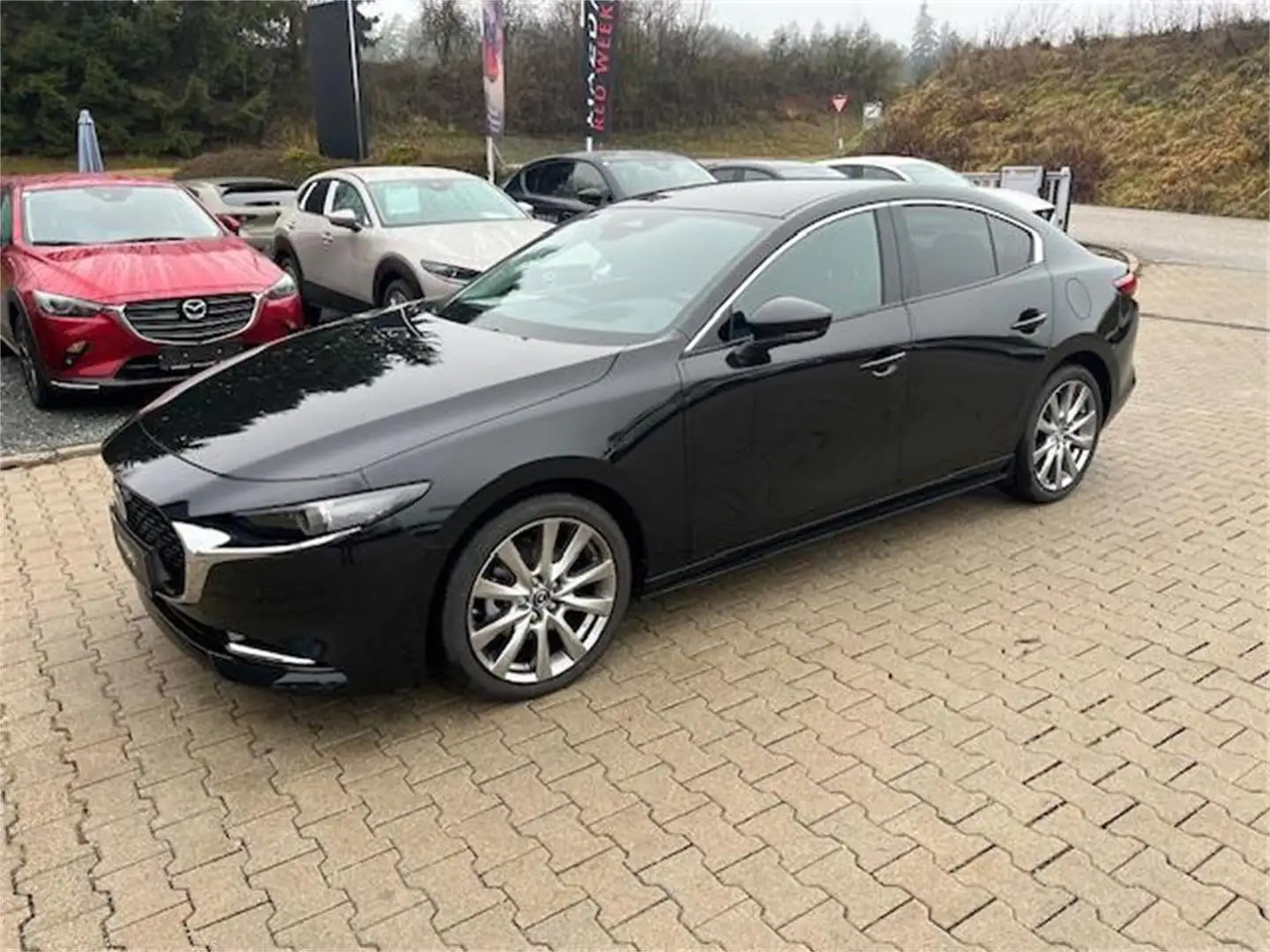 Mazda 3 Sedan e-Skyactiv X186 Exclusive-Line Jahreswagen Schwarz - 1