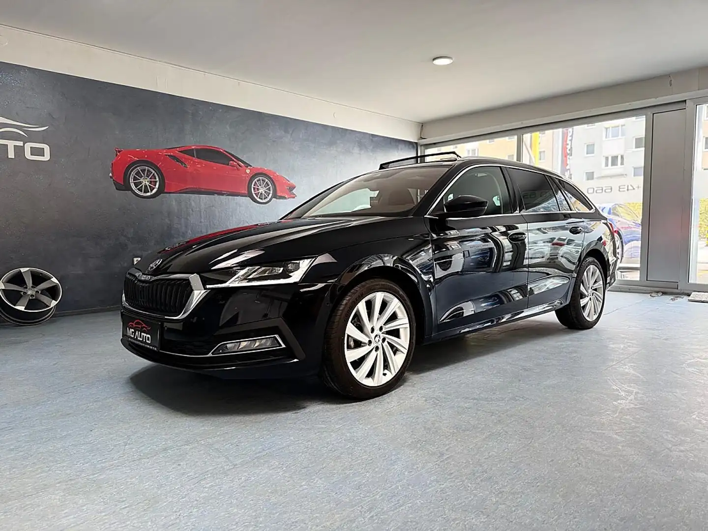 Skoda Octavia Kombi 2.0 TDI Premium DSG *CANTON*PANO*AHK*HEAD... Schwarz - 1